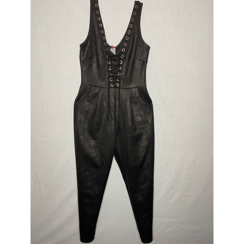 Black faux leather jumpsuit with silver elements!